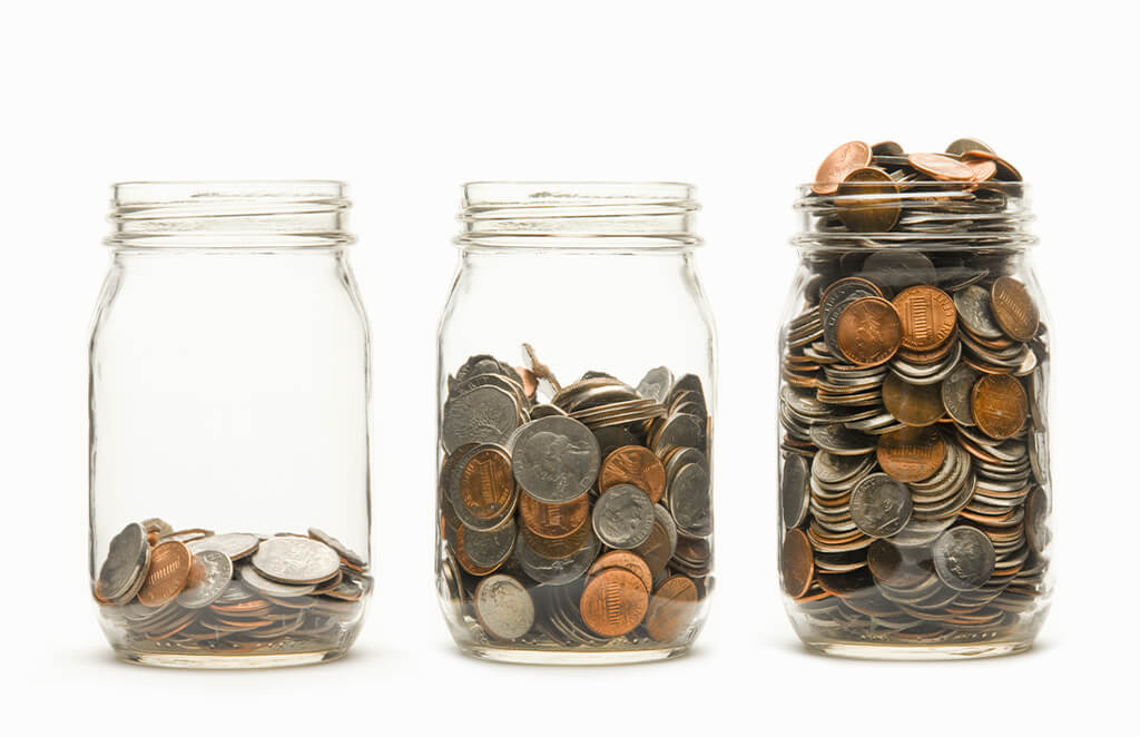 CW4K Donation jars filled with coins