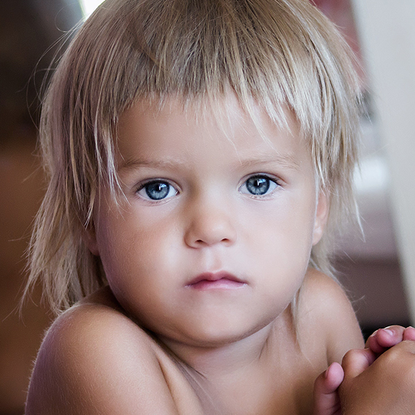 Headshot of blonde white child