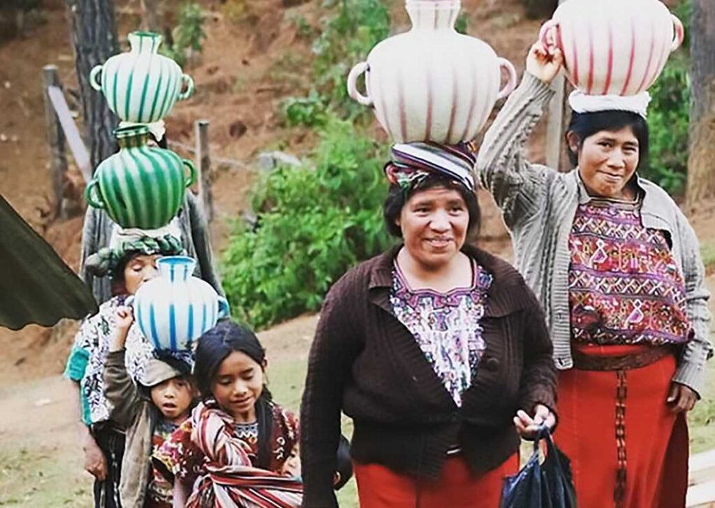 Women and girls in Visiban, Guatemala located in the Nebaj Municipality, haul water for construction of water system funded by CW4K